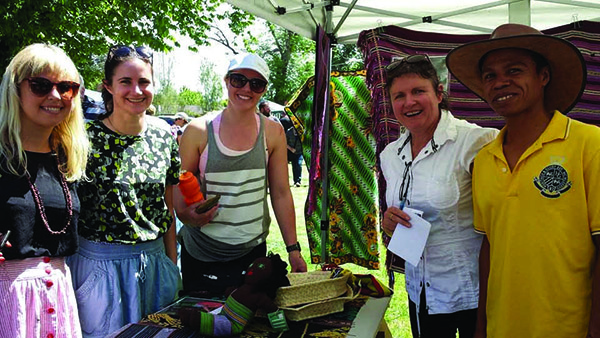 The Aldous clan: Lizzie and friend on left, Sara, and Julie with Joni at November Bush market